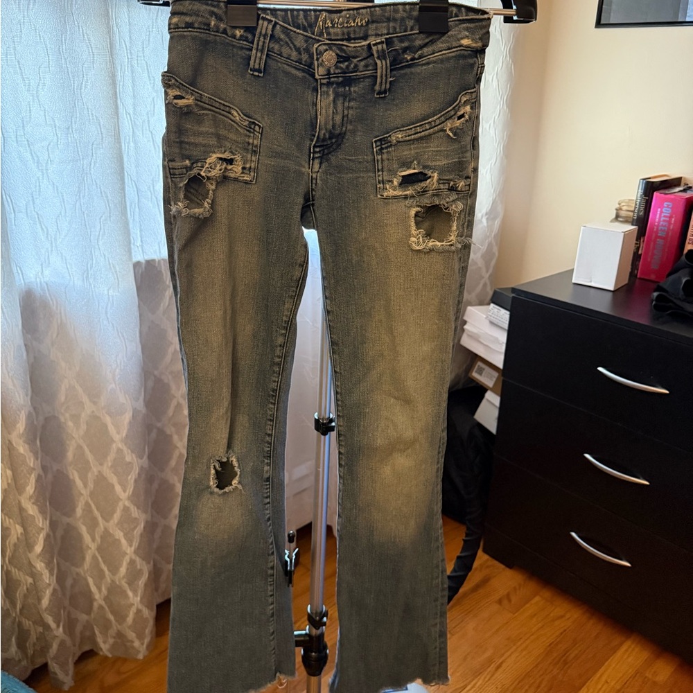 Distressed designer Marciano Jeans